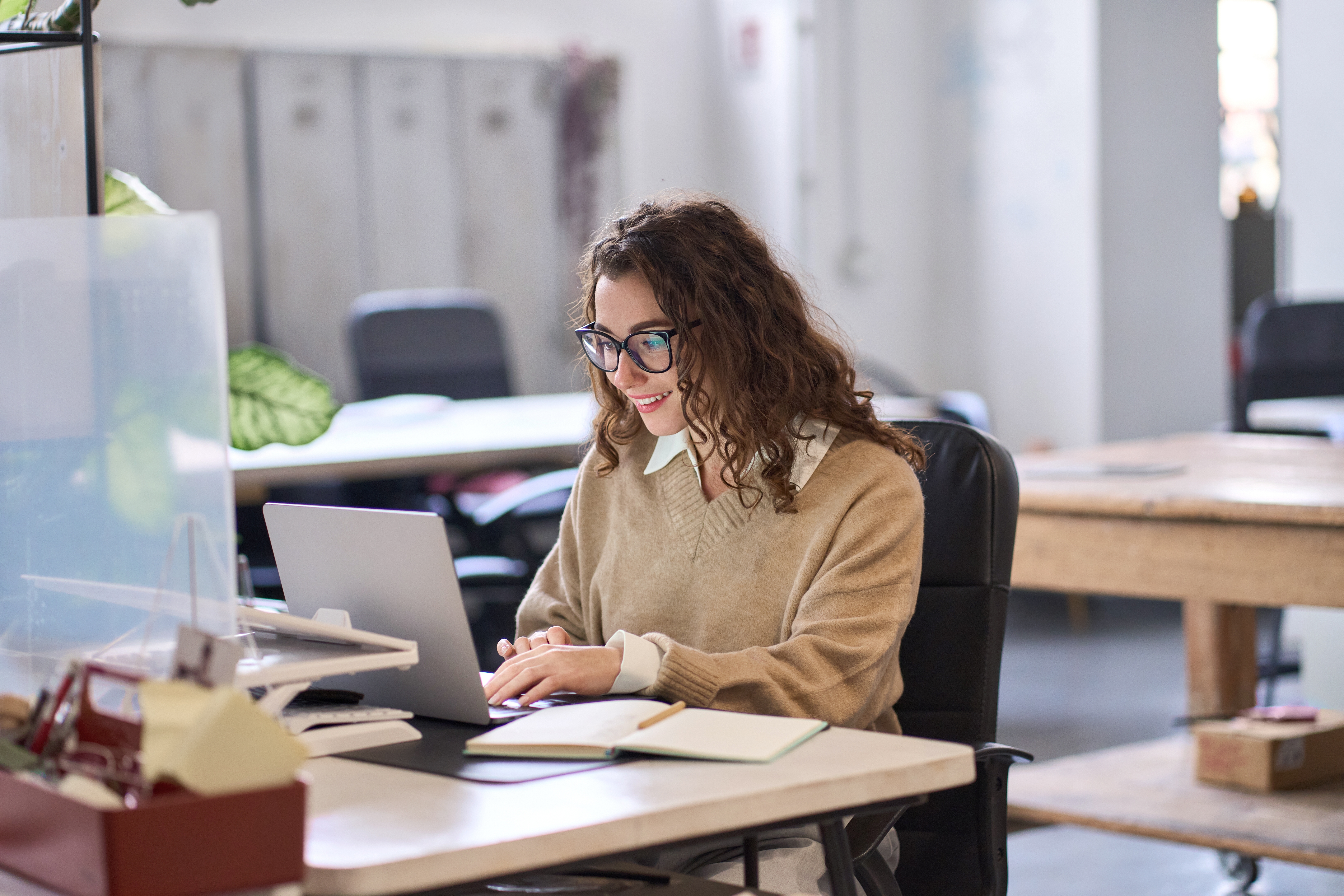 Conveyancer at desk working